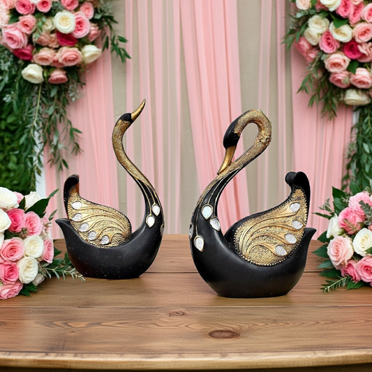 SwaSha elegant black and gold resin swan sculptures, modern animal figurines for home decor on wooden table