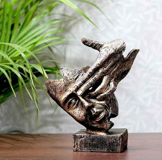 Bit Nite Modern Art Resin Showpiece, Abstract Thinking Face Sculpture with hand, on a wooden surface.