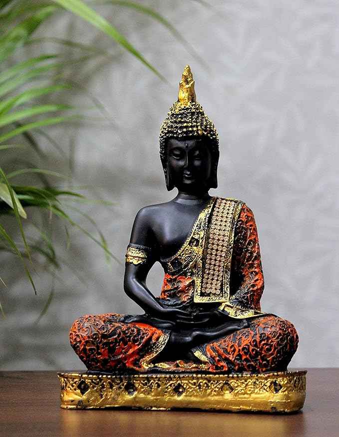 Serenity Buddha statue for living room, black and gold finish, meditating idol with orange and gold robe details